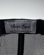 Todos | Detalle de la malla trasera trucker Sutā